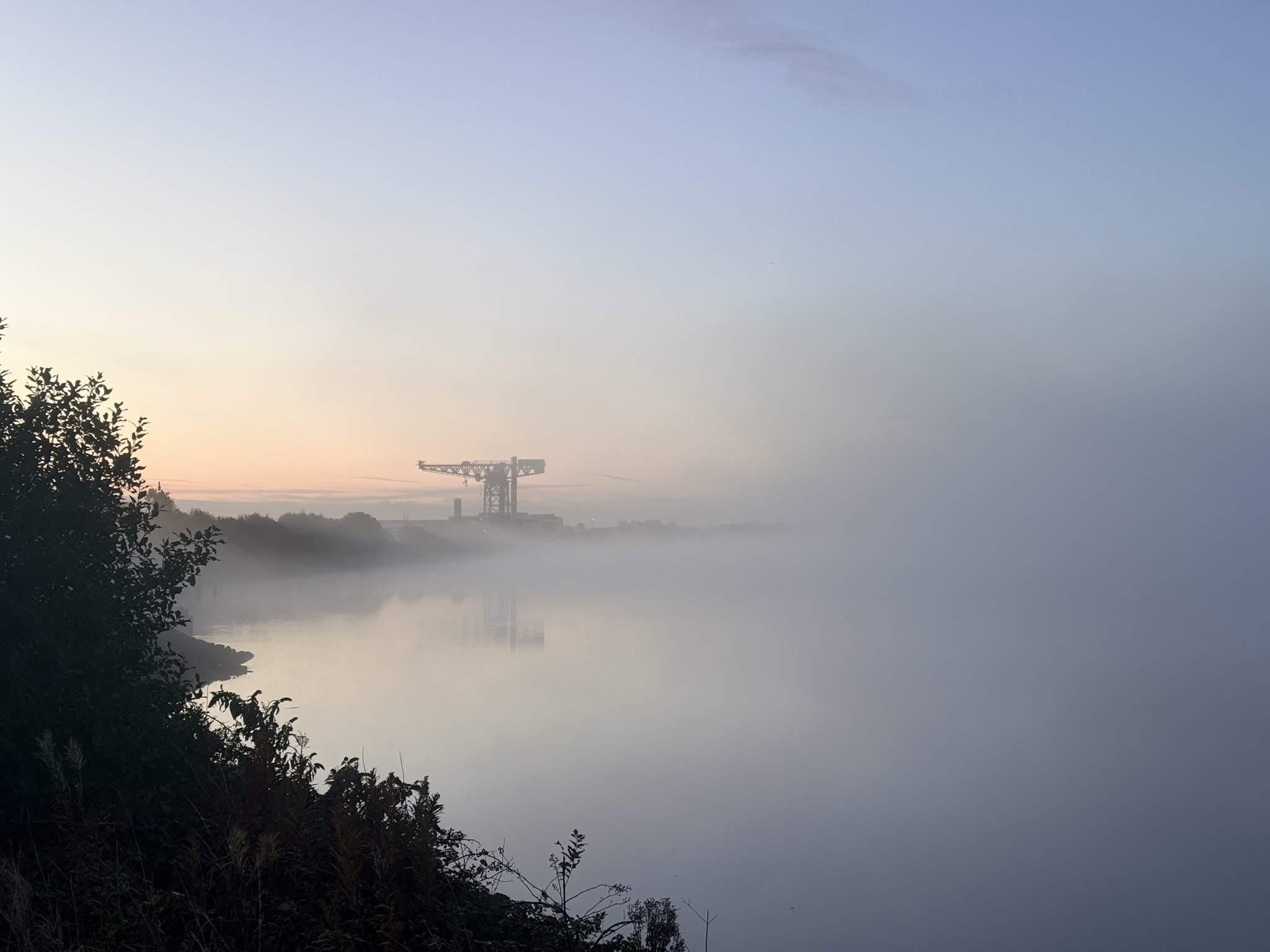 The Titan crane at Clydebank sitting in river mist at dawn